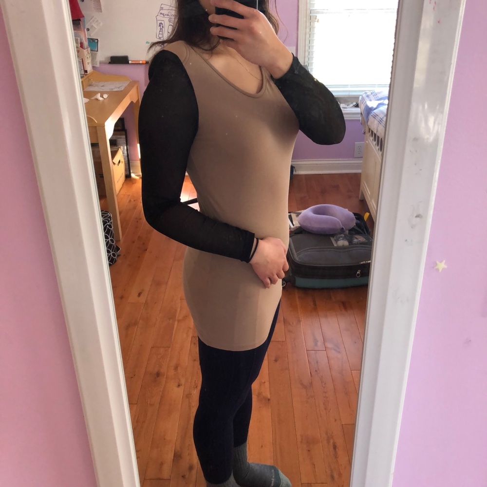 Nude dress with sheer black sleeves